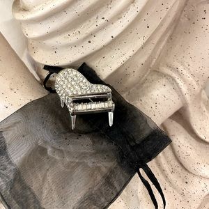 Crystal piano brooch